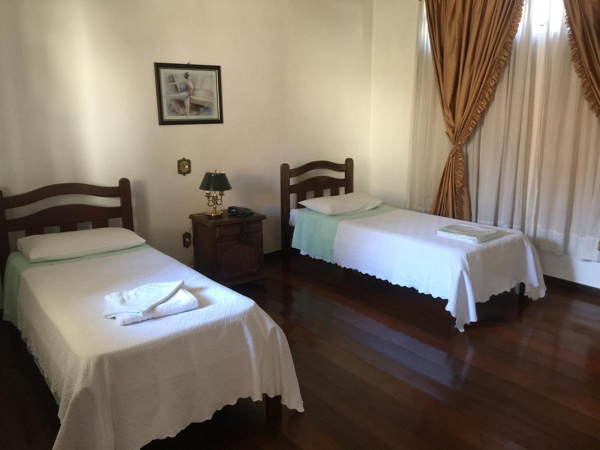 Pozzobon Hotel Moderno Betim Bagian luar foto