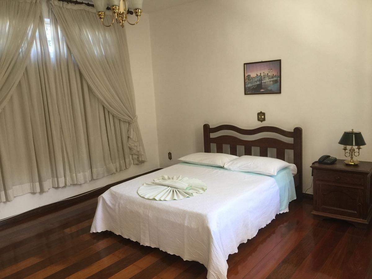 Pozzobon Hotel Moderno Betim Bagian luar foto