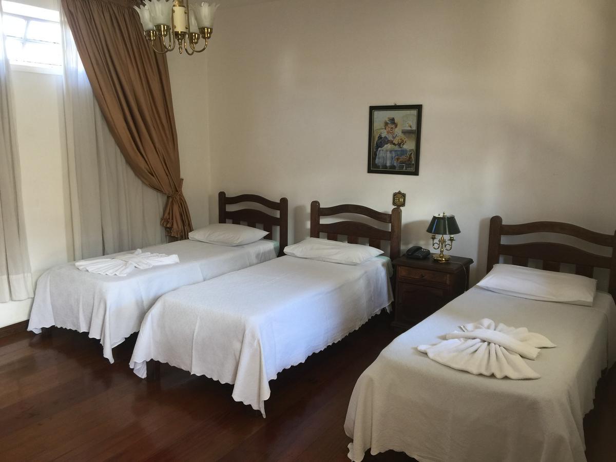 Pozzobon Hotel Moderno Betim Bagian luar foto